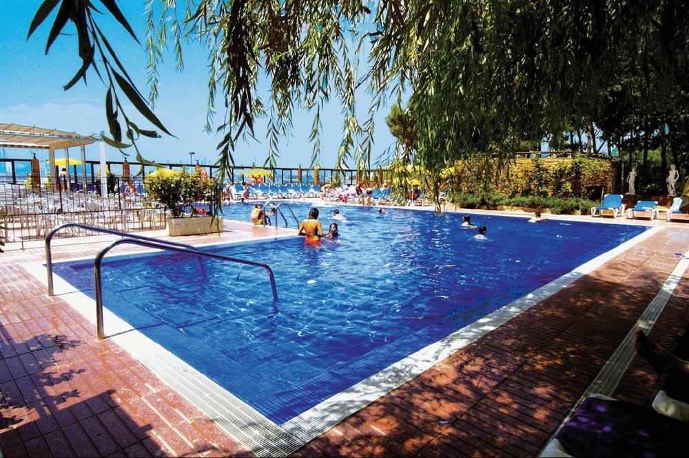 Hotel Univers Roses Bagian luar foto